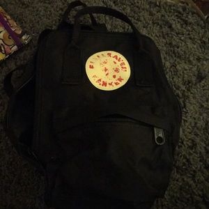 Real kanken mini black book bag.